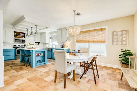 Easily serve homecooked meals from the adjacent kitchen