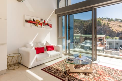 Luxury Apartment, 1 Bedroom, Kitchen, Mountain View | Living area | 55-inch Smart TV with cable channels, TV, Netflix