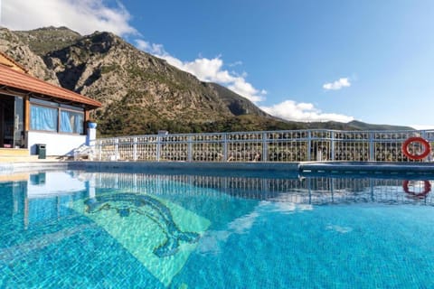 Outdoor pool, open 10:00 AM to 8:00 PM, sun loungers