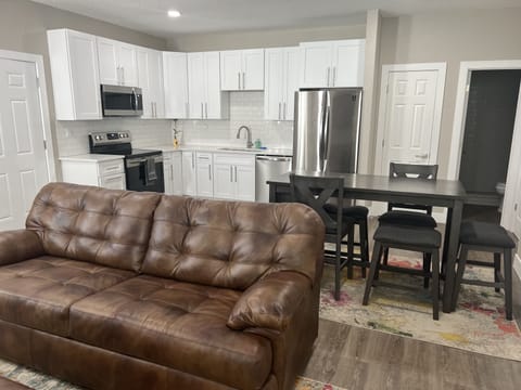 Full kitchen and dining table to enjoy a home cooked meal 