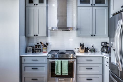 Fully remodeled kitchen with high end stainless appliances, soft close drawers, and stylish cabinetry.