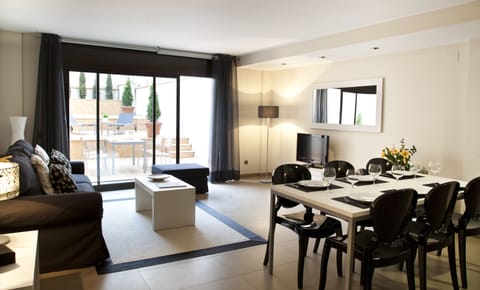 Duplex Apartment, 2 Bedrooms, Patio | Living room | 32-inch LCD TV with digital channels, TV