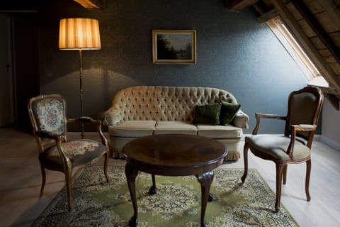 Family Room, Garden View | Living room | Flat-screen TV