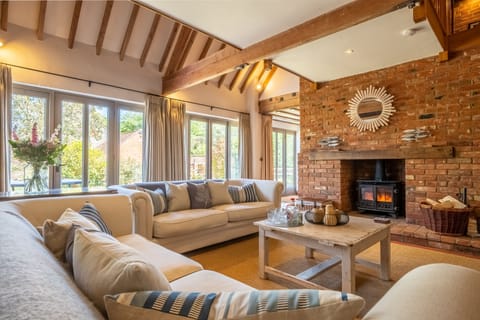 The Cart Shed, North Creake: Comfortable sitting room with wood burning stove
