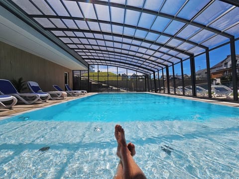 Seasonal outdoor pool, open 9:00 AM to 8:00 PM, sun loungers
