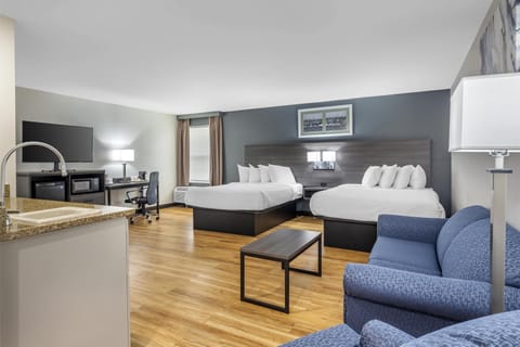 Suite, 2 Queen Beds, Non Smoking, Refrigerator & Microwave (Living Room;with Sofabed) | In-room safe, desk, laptop workspace, blackout drapes