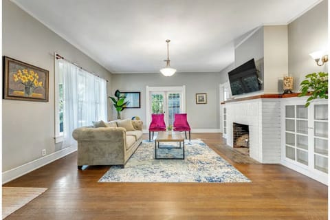 Main living room. Bountiful natural light. Smart TV.