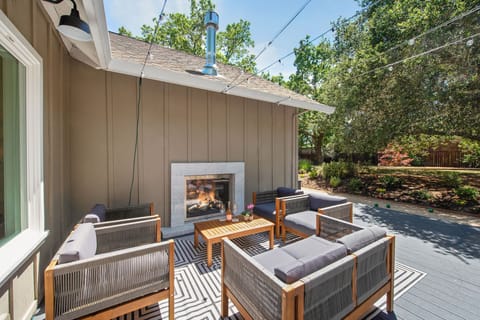 Indoor outdoor fireplace