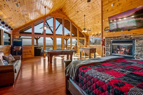 2nd bedroom with floor to ceiling windows with a Mountain View 