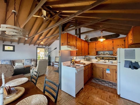 Open main rooms with cathedral ceiling.