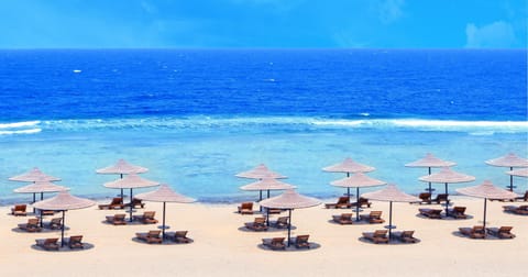 Private beach, beach umbrellas, beach towels, scuba diving