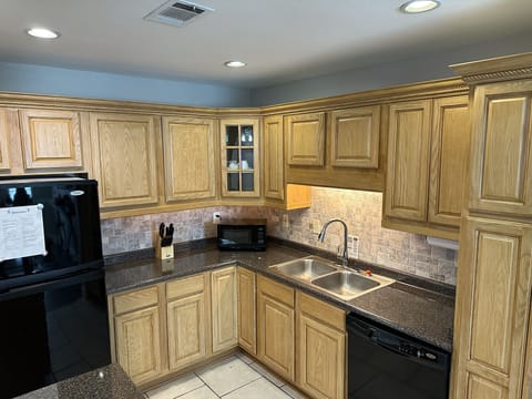 Kitchen with pots, pans and many of the comforts of home.