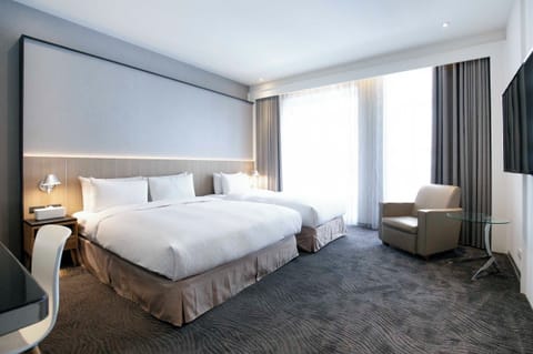 Family Triple Room, Balcony | Free minibar, in-room safe, desk, laptop workspace