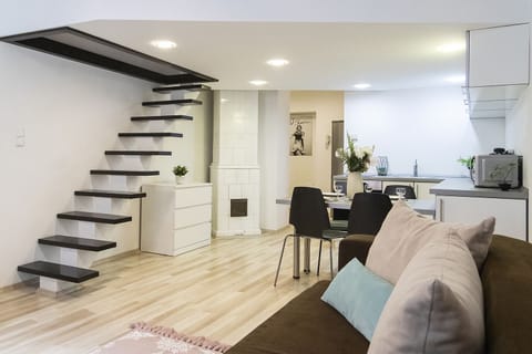 Design Apartment | Living area | 37-inch LCD TV with cable channels, TV
