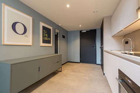 Standard Apartment | Private kitchen | Fridge, dining tables