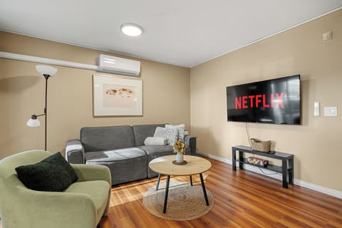 Curl up with a cozy blanket and enjoy your favorite shows on the Smart TV.
