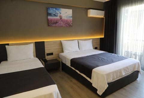 Standard Triple Room | Premium bedding, minibar, free WiFi, bed sheets