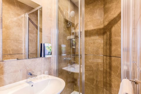 Classic Room, Multiple Beds, Non Smoking | Bathroom | Hair dryer, towels