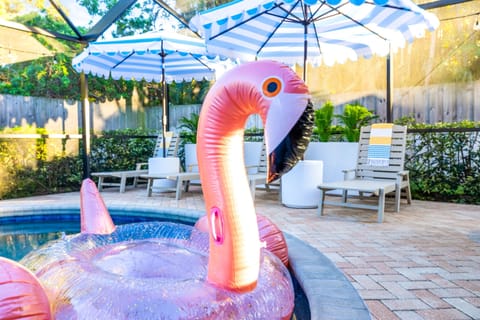 Large beautiful pool awaits you with large lounge seating area that will fit entire family. Come out here to enjoy the sunshine, grab a bite to eat, or just relax poolside. Fun for everyone who joins! 