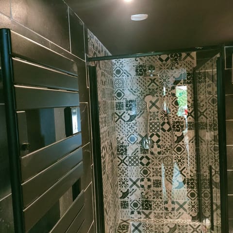 Romantic Room | Bathroom | Shower, rainfall showerhead, hair dryer, bathrobes