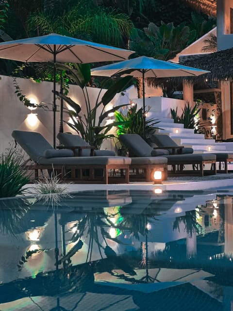 Outdoor pool, pool umbrellas, sun loungers