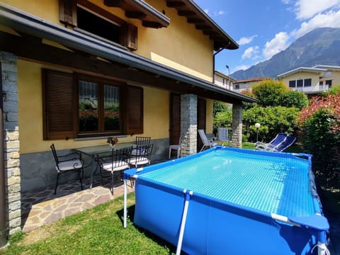 Building, Plant, Property, Window, Furniture, Chair, Cloud, Shade, Swimming Pool, House