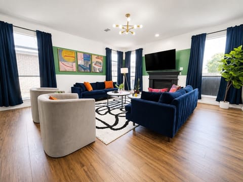 This living room is the perfect blend of sophistication and comfort - sit back, relax, and make yourself at home!