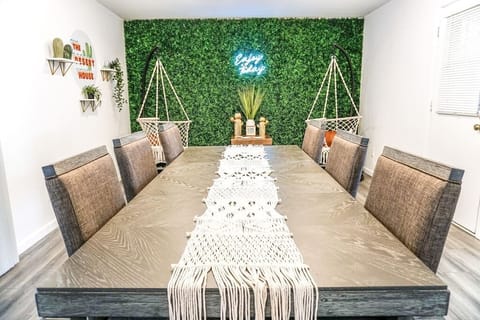 Dine in style and "Enjoy Today" with our custom grass wall (great for pictures!)