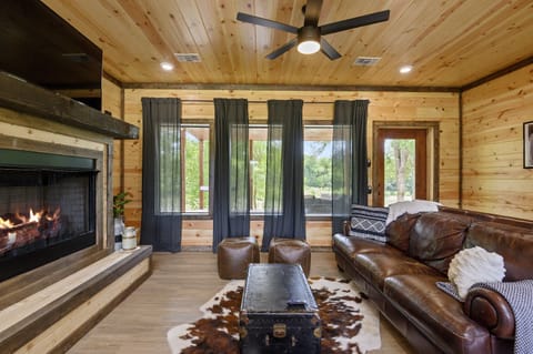 Cozy up by the indoor fireplace — ideal for movie nights or a lazy morning with coffee.