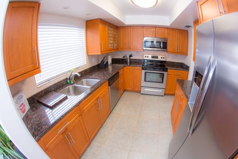 Family Triple Room | Private kitchen | Microwave, coffee/tea maker, toaster, paper towels