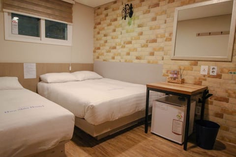 Triple Room (Max 3 only,NoView) | Down comforters, iron/ironing board, free WiFi