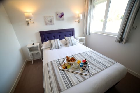 Premium bedding, down comforters, individually decorated, desk