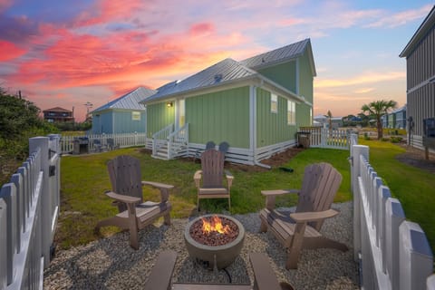 Fully Fenced Backyard with Fire Pit, Weber Gas Grill and Plenty of Seating