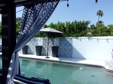 Backyard patio with Pool & Jacuzzi to enjoy.