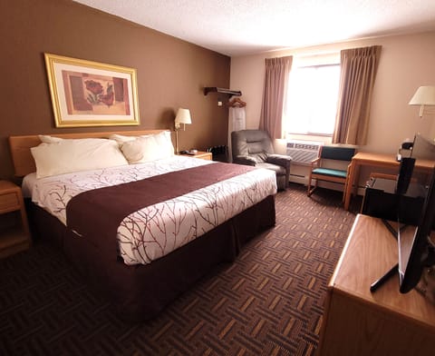 Basic Room | Down comforters, pillowtop beds, laptop workspace, iron/ironing board