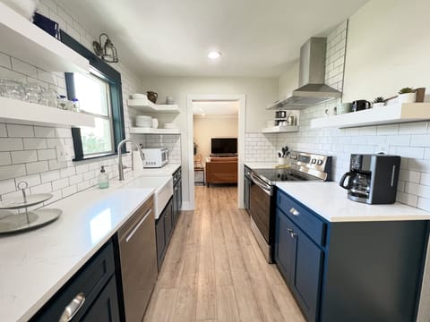 Galley kitchen that opens up to the main living area.
