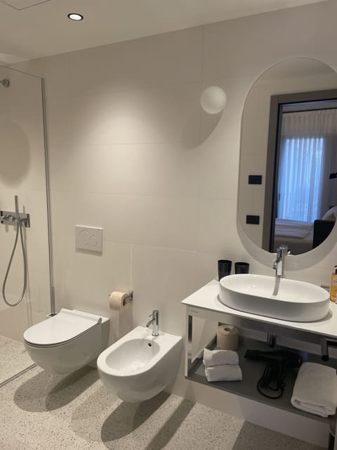 Deluxe Triple Room | Down comforters, minibar, in-room safe, desk