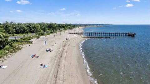 Aerial view of Walnut Beach on the Long Island Sound with pier. 