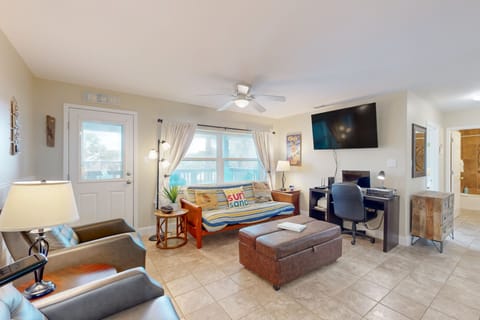 Sea Isle Village Unit 10 entry with pool and glimse of the Gulf View