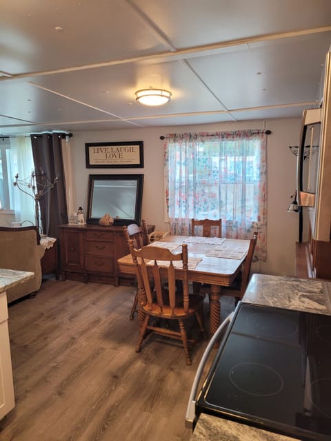 Dining table has extra leaves to make it larger