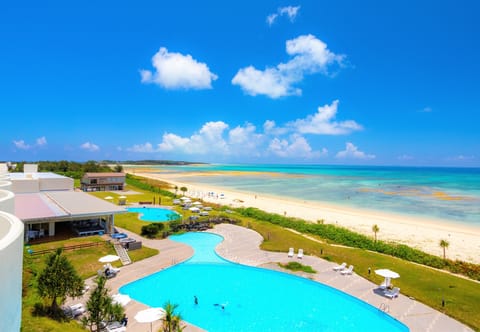 Outdoor pool, pool umbrellas, sun loungers