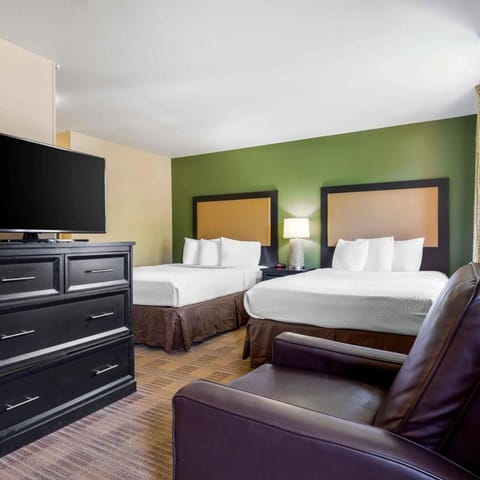 Deluxe Room, 2 Queen Beds, Non Smoking | Desk, iron/ironing board, WiFi (free), bed sheets