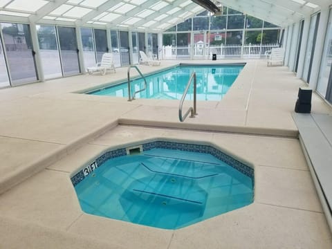 Indoor pool, a heated pool, open 9:30 AM to 9:00 PM, sun loungers