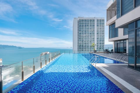 Outdoor pool, open 7:00 AM to 8:00 PM, pool umbrellas, sun loungers