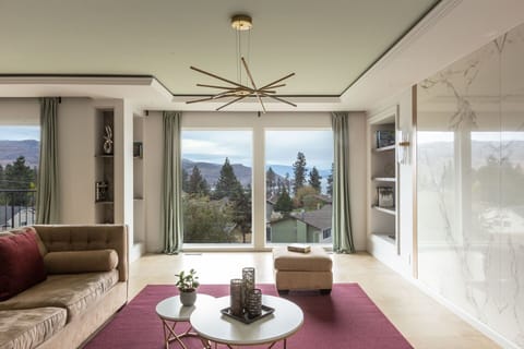 Living room with lake and mountain view