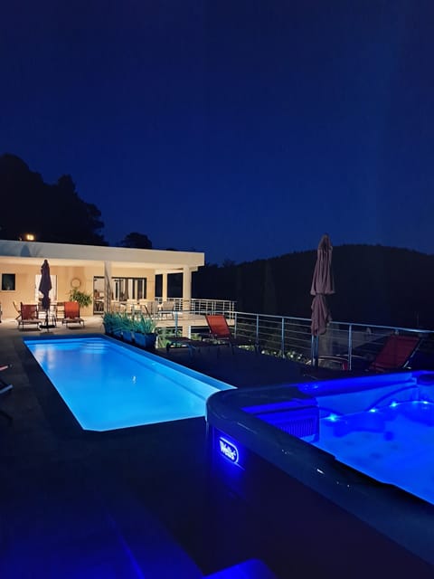 Outdoor pool, a heated pool, sun loungers