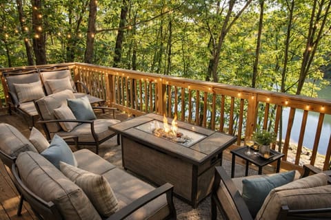 Main level deck featuring a fire pit