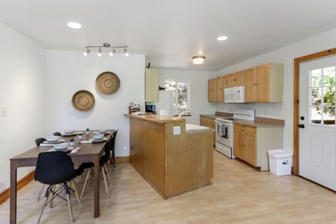 Access the back deck with gas grill directly from the kitchen.