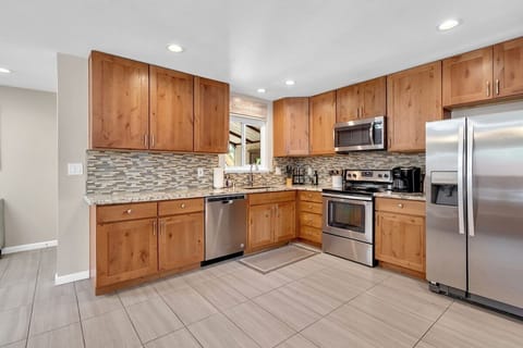 Updated kitchen with ample counter space and cupboards.