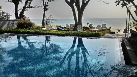 Outdoor pool, pool umbrellas, sun loungers